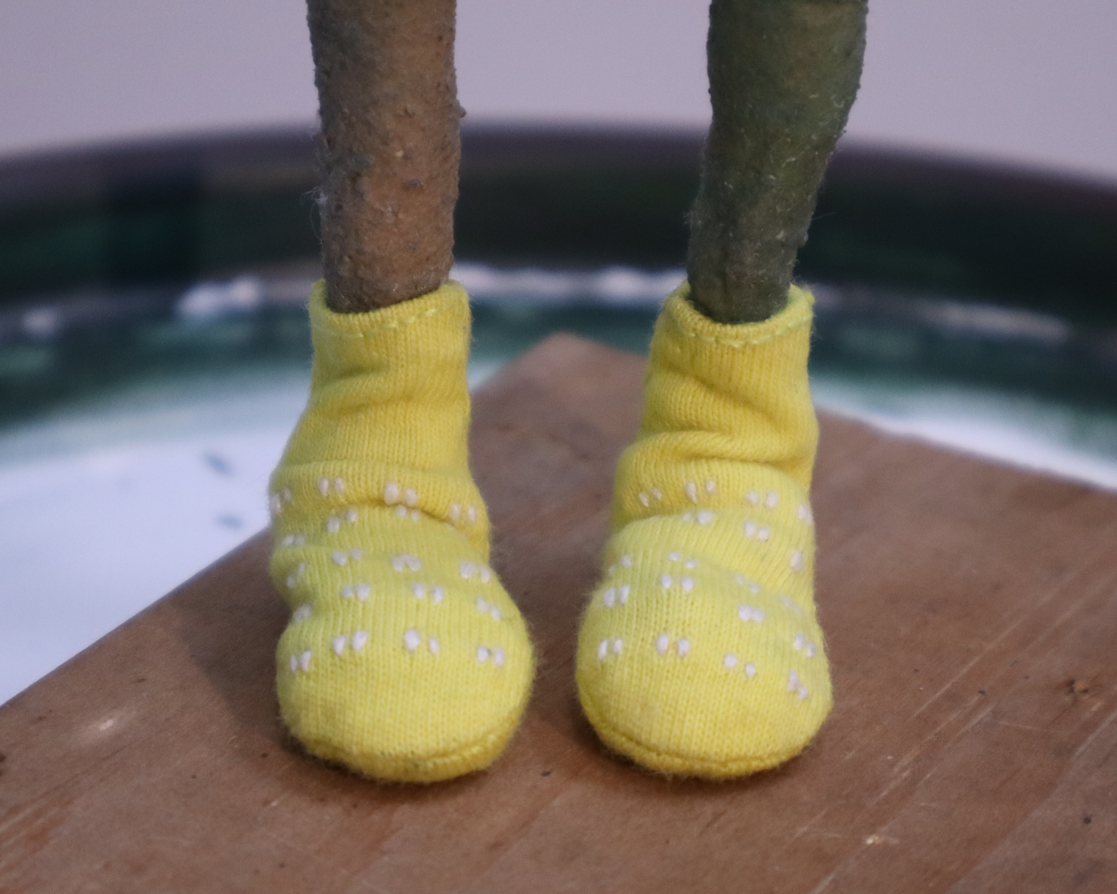 Hospital socks on puppet, front